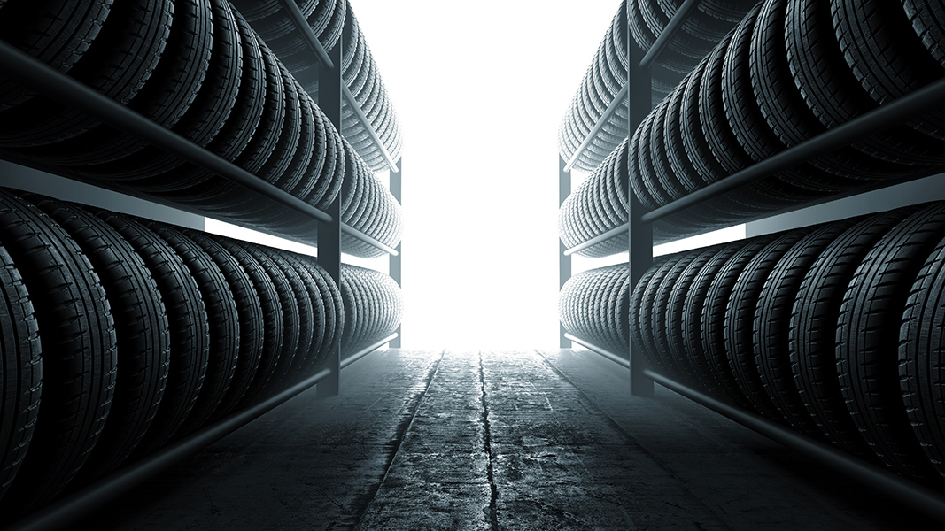 3D illustration, car tires rack in workshop background, back lit